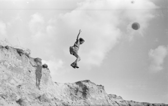 Sem PresserGirl jumping off a duneThe Netherlands, 1944Once again Presser is very much aware of the shadows.