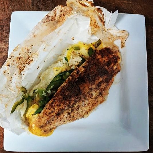 TwinLakesInn's tweet photo. Baked in a paper envelope, served with shaved veggies and an aromatic jasmine rice, we present one of our weekend headliners: Redfish en Papilotte. It's a Valentine wish for your taste buds and tummy. Available for dine-in, pick-up or delivery this weekend:  719-486-7965. https://t.co/ZCL5yeK7iE