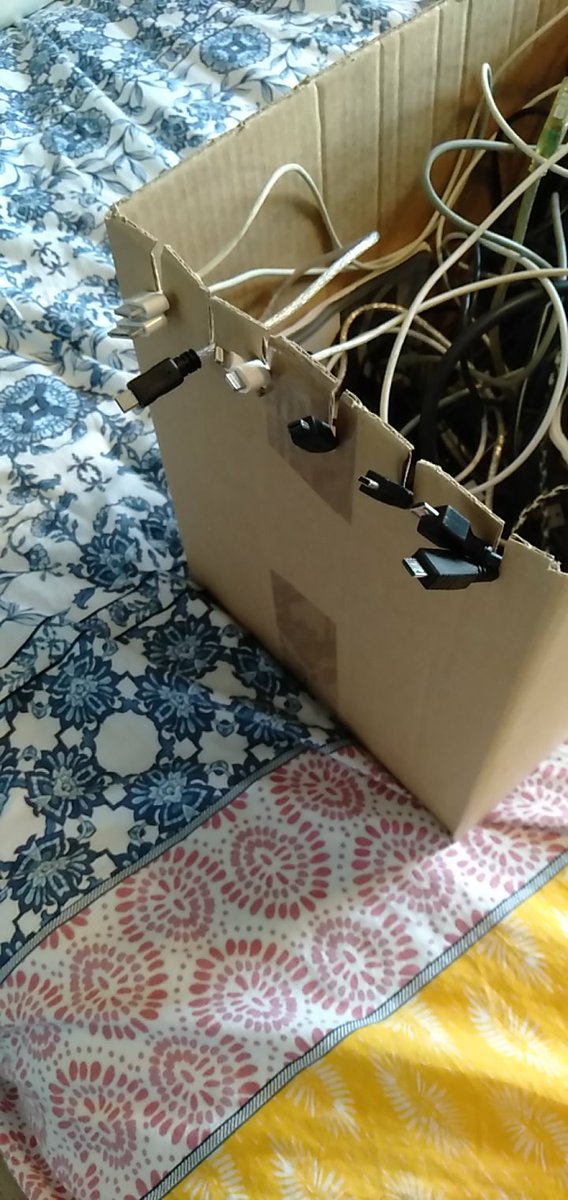 skywordz's tweet image. Everyone's got one of those messy cord boxes, right? An hour to find anything amongst the tangles, looking at each cord twice because you can't keep track?

Problem solved. The cords still get tangled, but I can find the commonly used ones instantly.

I'm a genius.

#lifehack