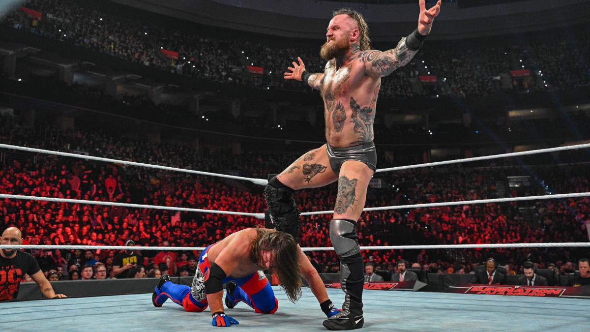 Aleister still declines and says he doesn’t like how Roman runs things on SD. We get the rematch and Aleister has Big E in position for the Black Mass like in the pic. Jey Uso’s music hits but he doesn’t come out. Aleister is distracted, Big E hits a low blow and wins.