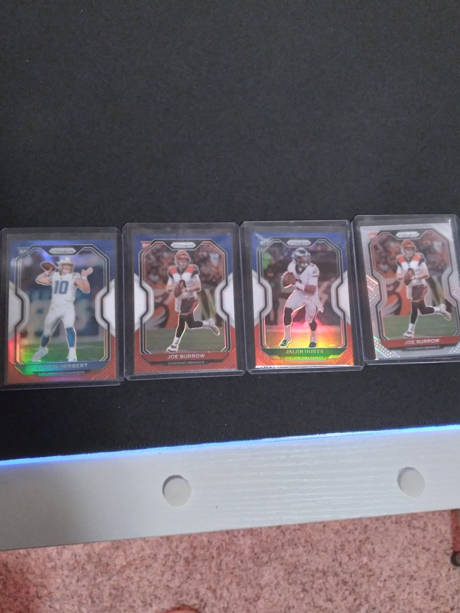 Burrow silver 
Burrow red white and blue 
Hurts red white and blue 
Herbert red white and blue 
Not bad for a few value packs