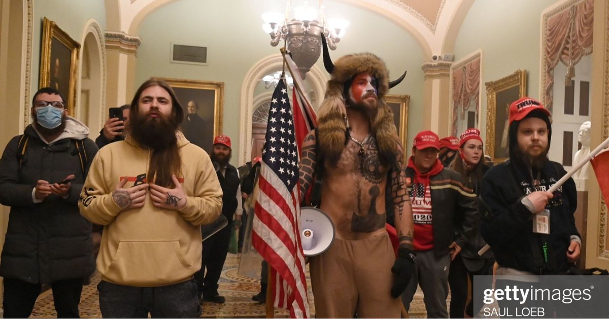 twfisher1's tweet photo. 1/ A new thread, on this guy you can spot lurking in the background on some photos of early invaders to the capitol.  It turns out he is a parler user #RandomWatching who posted some interesting videos there. https://t.co/v1h6PKH8Hn