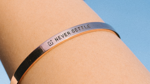 oneplus's tweet photo. We wear Never Settle on our sleeves. https://t.co/NPWKjOCdz0