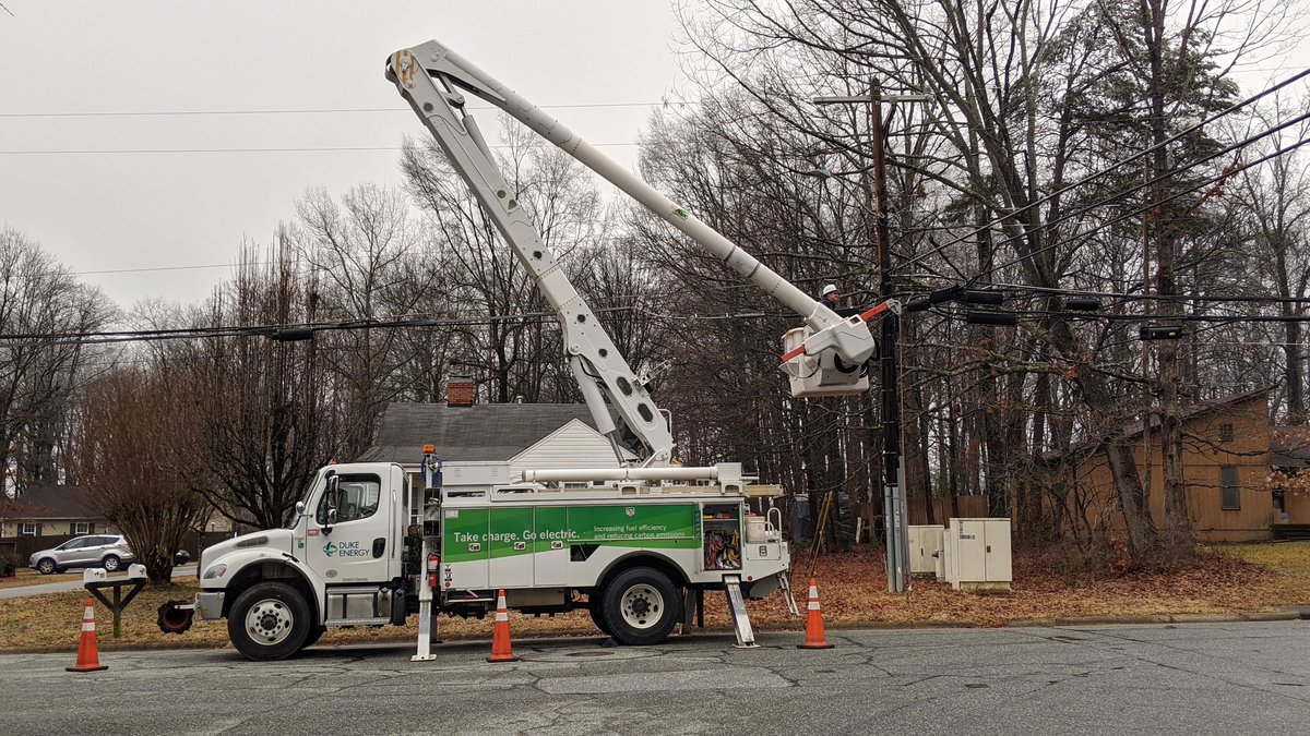 DE_JeffB's tweet image. A local @DukeEnergy crew repairing multiple damaged poles and downed lines near N. Elm St. in Greensboro. This neighborhood alone had about half a dozen poles to repair to restore this line.
