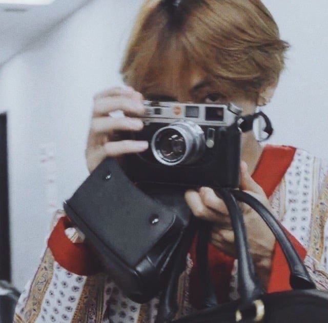 because you smile is the prettiest thing for him, so here he is, taking a picture of your beautiful smile. "that's right baby, keep on smiling it suits you perfectly"