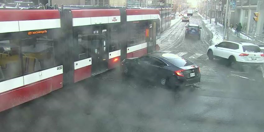 TPSOperations's tweet photo. COLLISION:
Dundas St W + University Ave
- reports vehicle/street car collision 
- no injuries reported
- occ'd in middle of intersection
- @TPS52Div o/s
- find alternate of travel
- will update
#GO285585
^ep2 https://t.co/ydOG1xatHy