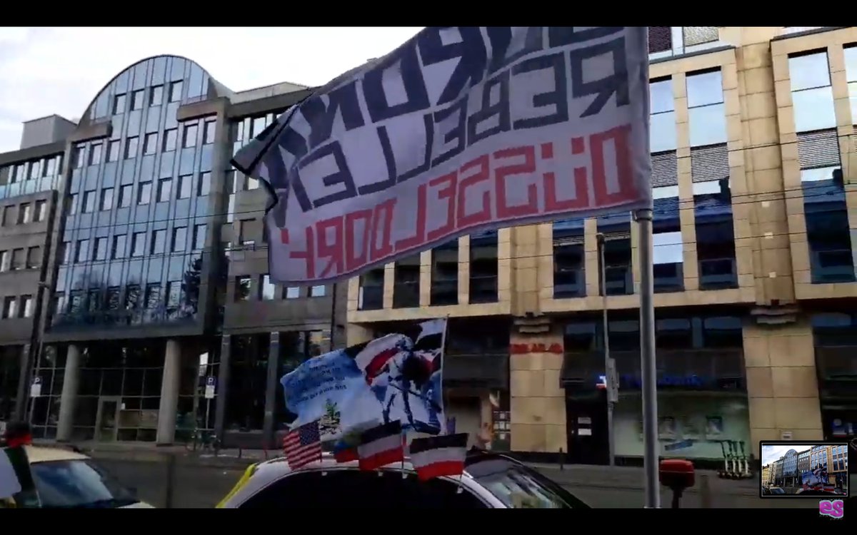 Alerta0211's tweet photo. "Masken ab, Gehirn an!" Ist der absurde Soundtrack zu der grotesken Szenerie. Das Dauergeplärre von #MasterSpitter ist langsam sehr belastend. https://t.co/aAGqTN6XmS