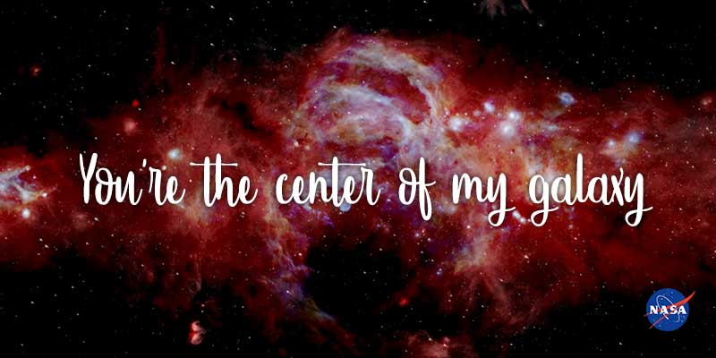 Image of the Milky Way galaxy in infrared, taken by the SOFIA telescope. Text: "You're the center of my galaxy"