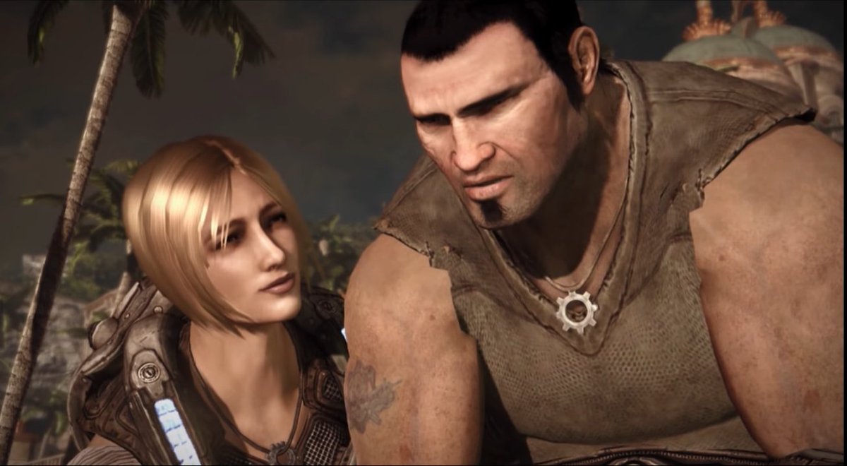 Shot from the ending scene of Gears of War 3. A close up of Anya and Marcus talking while they sit on the beach. 