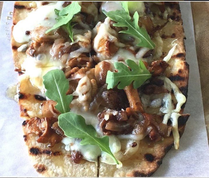 February weather has us craving our Legendary wild mushroom flatbread with caramelized onions, Tallegio cheese, arugula and truffle honey.