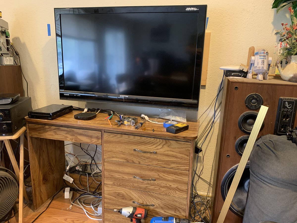 Can barely see the plywood sticking out the side. But it is visible. Might have to get a bigger TV. Someday.