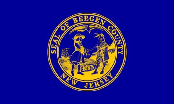 BERGEN COUNTY: Built on the Palisades over the Hudson River. Blue for the river, white for the cliffs, gold is something corny - the spirit of the people? Seal is super racist and has got to be changed but I stuck it on so this tricolor didn't get confused for a sovereign nation.