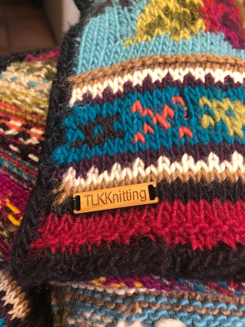The shawl I knitted for a relative of my husband.

I have name tags TLKKnitting for my knitted products and this particular stash is separate from my Etsy shop.

Wooden labels for my knitting.

I am in love with the tags.

 #supportetsy #etsyshoptlkknitting