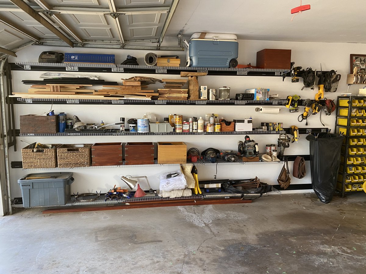 The east wall uses the Kobalt wall system from Lowe's (not getting a nickel from anybody for any product mentioned in this thread, just telling you what I used). It can hold either shelves or a system of padded hooks. On the shelves, I have miscellaneous materials.