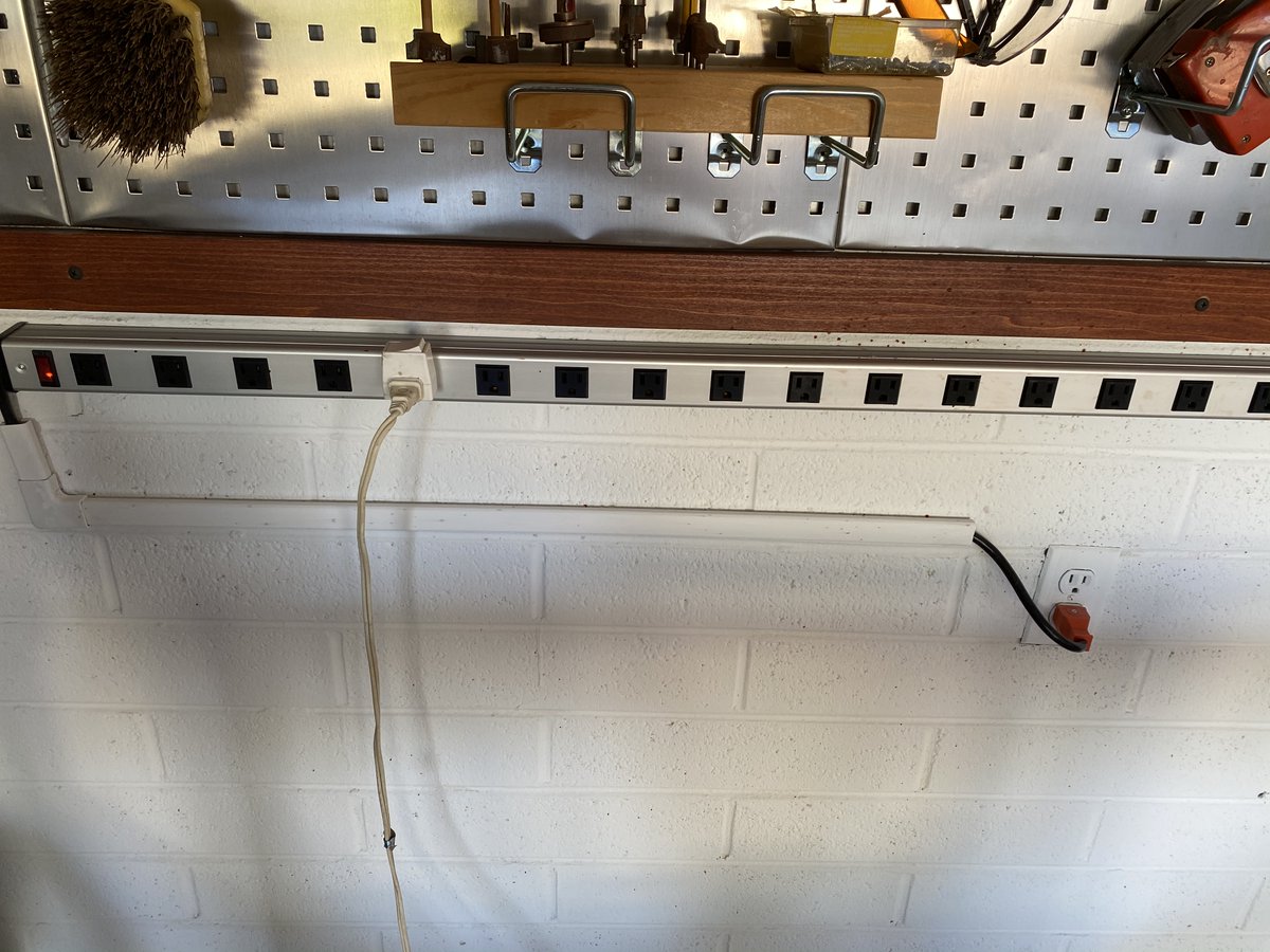 There are never enough outlets in the shop, so I found this crazy 20-outlet strip on Amazon. Should be enough! I hate extra, coiled wire - so I chopped its 12-foot cord to roughly 3 feet and put on a new plug, then covered it with cord-channel. Neater that way.