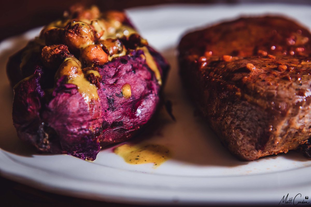 goat_path's tweet photo. Day 45/60
It’s #SupperSunday!
Purple sweet potatoes stuffed with roasted chickpeas and tahini dressing.
And a big fat juicy steak.
@danielmkim and @bullcitystorm can you rate my plate, please? https://t.co/Rd6E4Ppf76
