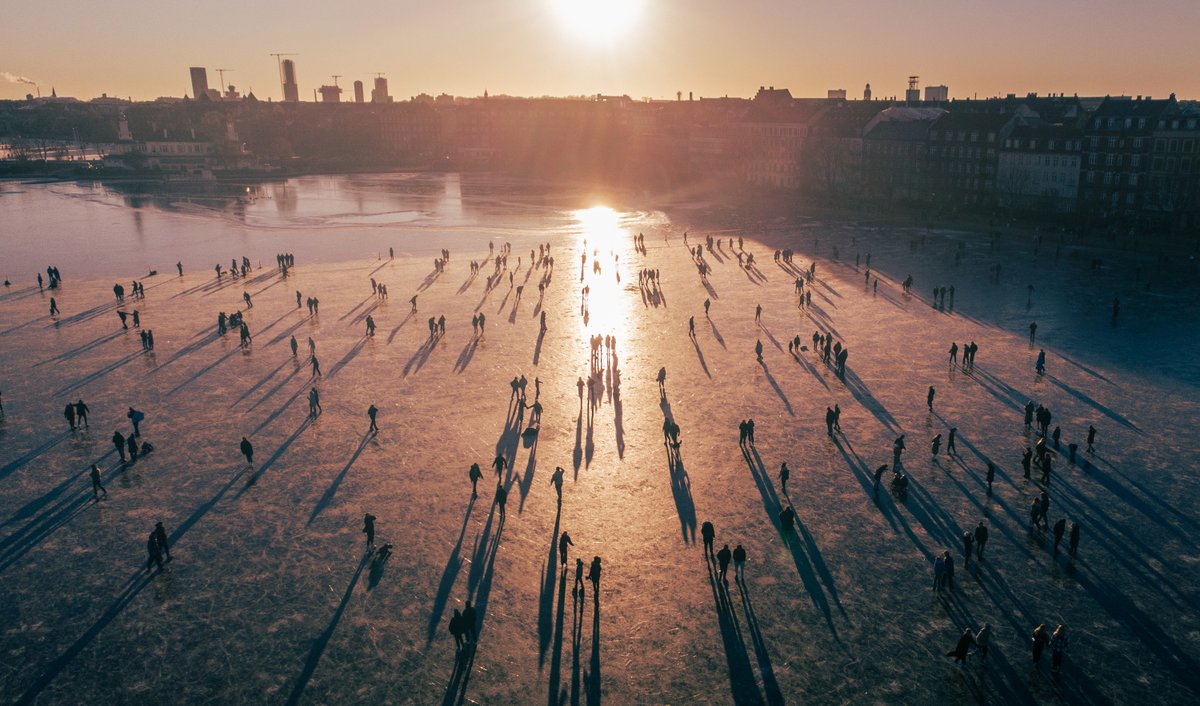 Walking on the frozen Copehagen lakes at sunset. 

#copenhagen #lakes #frozen #ice #is #soerne #drone