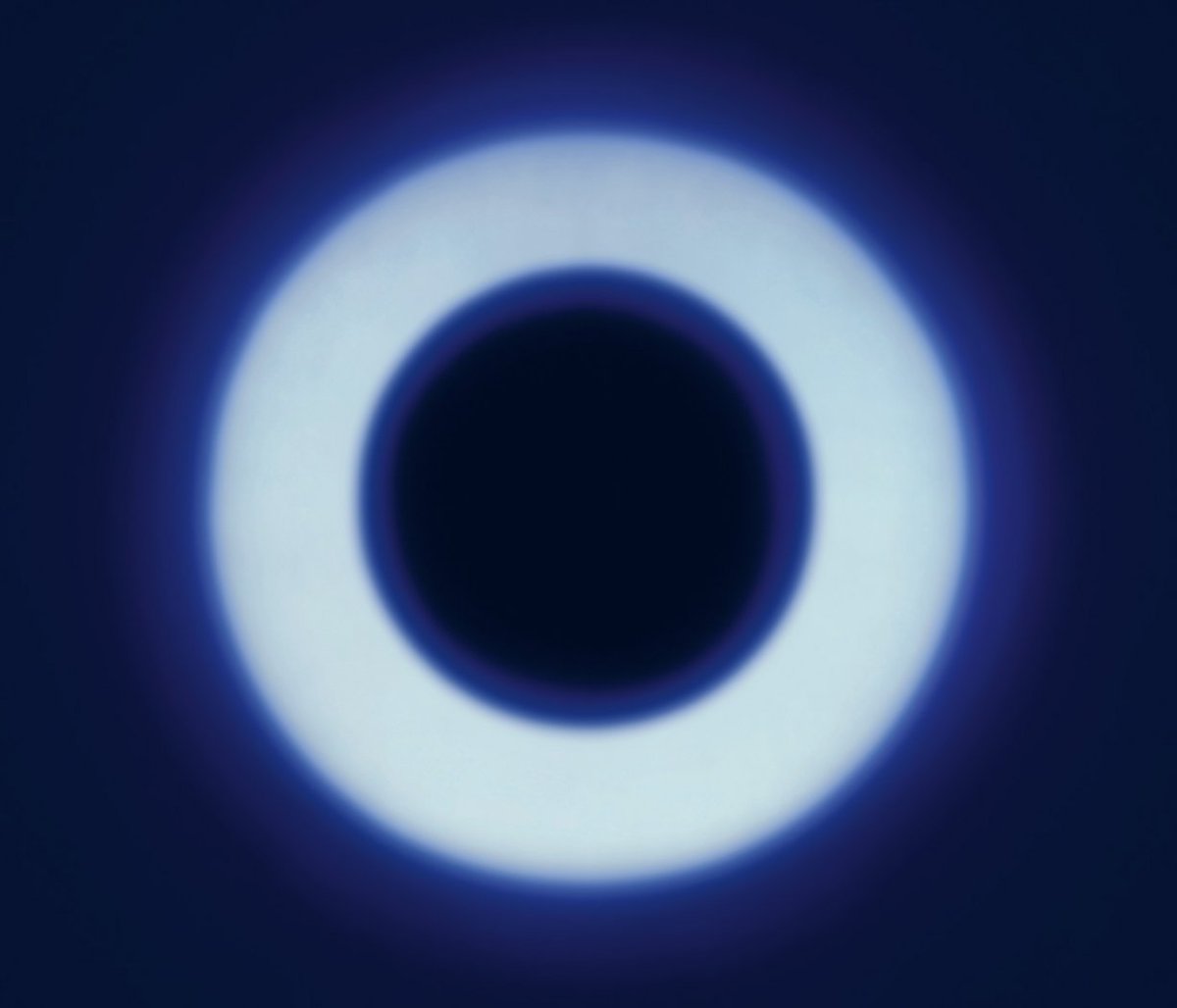 Garry Fabian Miller's (b. 1957) work slowly exposes light through coloured glass, liquid and cut forms onto photographic paper, creating camera-less renderings of geometric forms.