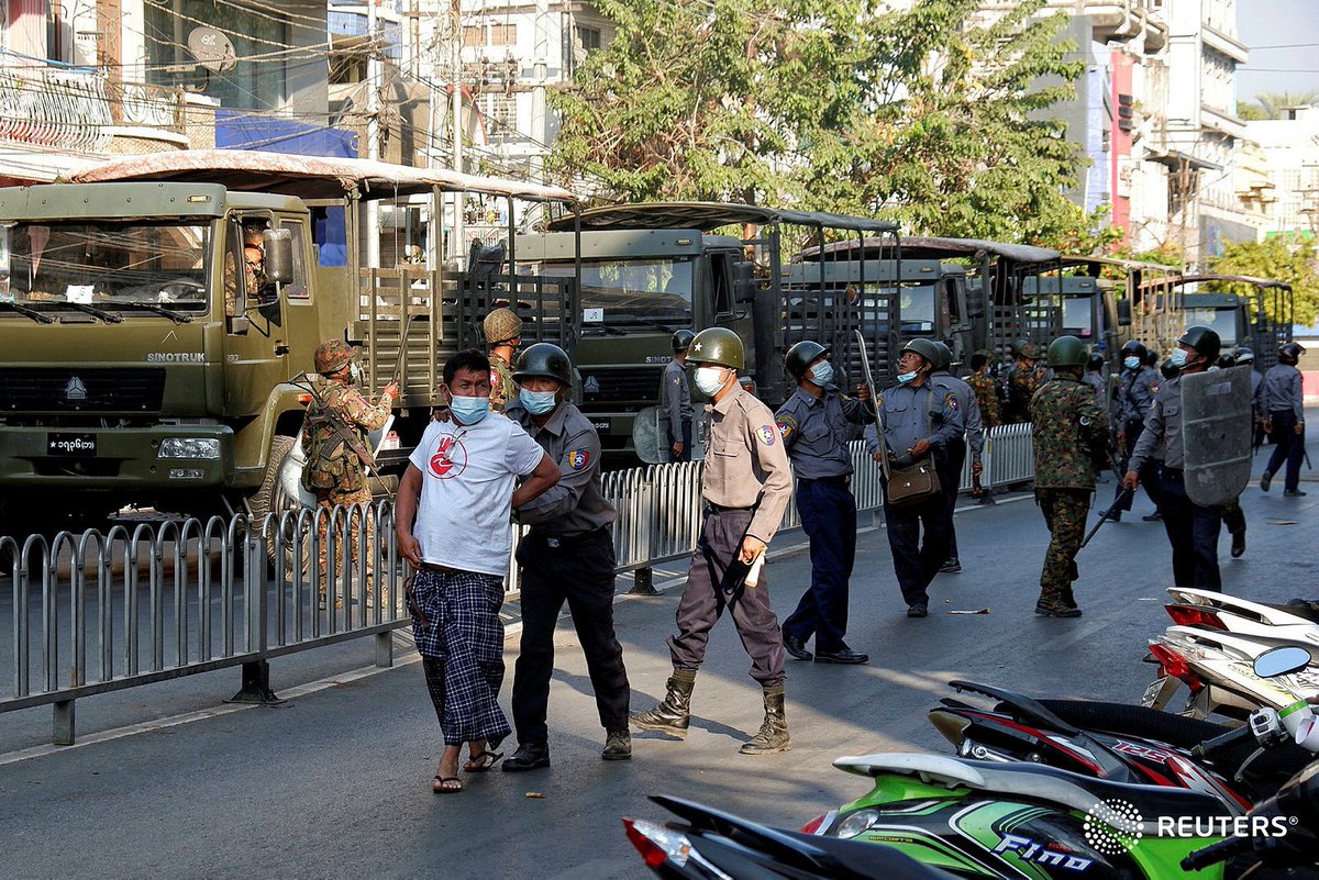 soezeya's tweet photo. Police detains a man during a protest against the military coup in Mandalay, Myanmar, February 15, 2021. REUTERS #WhatHappeningInMyanmar #Coup15Feb https://t.co/e1JXwni7GA