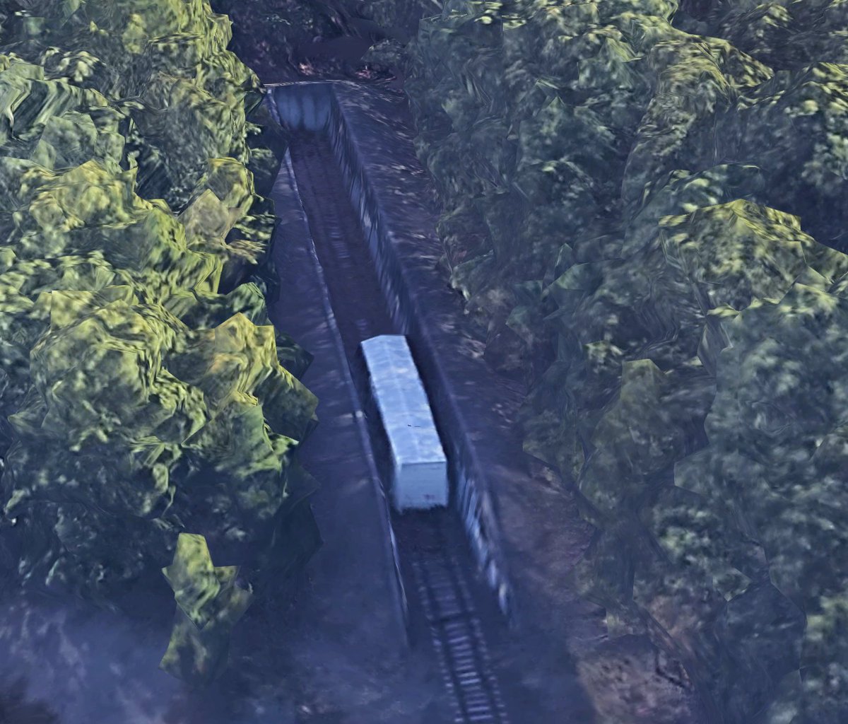 Each one of the "leaves" is a special, sunken track designed to absorb the impact of an explosion in case something were to happen with any of the boxcars. You can even see some stored cars here on Maps, with a nice close view of the sunken track as well.