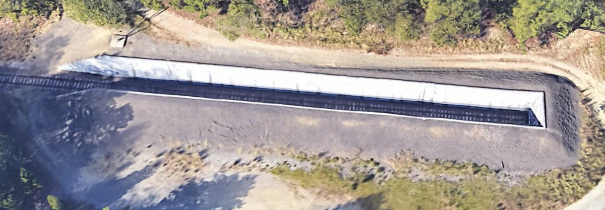 Each one of the "leaves" is a special, sunken track designed to absorb the impact of an explosion in case something were to happen with any of the boxcars. You can even see some stored cars here on Maps, with a nice close view of the sunken track as well.