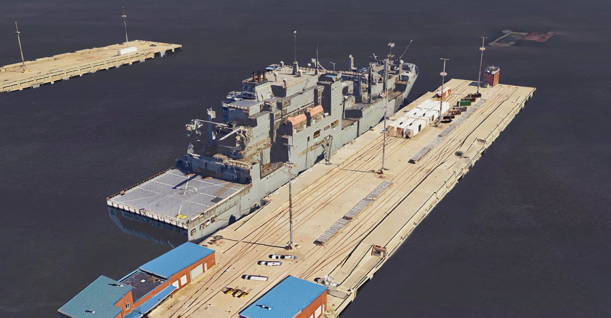 Zoom in close on Maps's 3D view, and you'll see an odd ship with some interesting looking boxcars. These are used to transport munitions to a specialized storage site in New Jersey (we'll get to that in a bit). Munitions are offloaded on these piers and shipped inland...