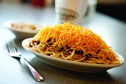 eventually adding grated cheese as a topping for both the chili spaghetti and the coneys, also in response to customer requests.