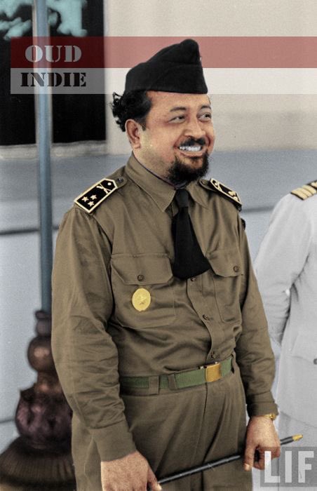 Gatot Subroto with a folded neck tie that blend with military shirt