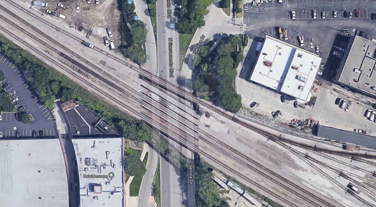 I am having trouble figuring out which of the 3 separate Chicago & Northwestern trestles that cross over Sacramento (then Humboldt Blvd). I think it is the furthest south, but the houses on an angle is throwing me unless the photo was reversed & those are along Grand.15/