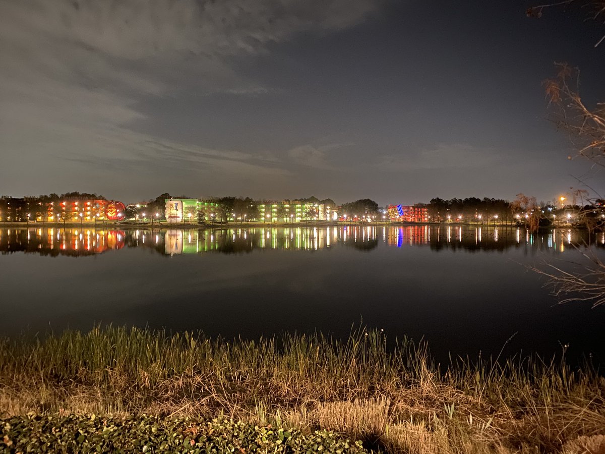 MassMouse's tweet photo. Taken on a recent WDW trip. Pop Century from across Hour Glass Lake. https://t.co/DL4hKFLtya
