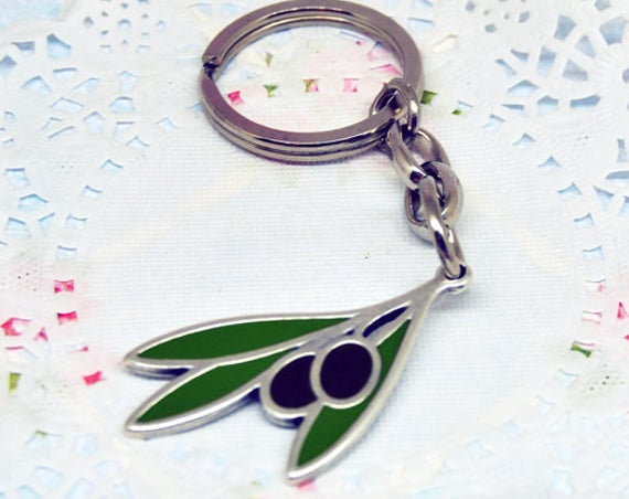 SevenkeysE's tweet photo. enamelled olive with leaf https://t.co/fruix306EE via @EtsySocial #etsyshop #etsy #etsyshop #valentinedaygift #birthdaypresent #keycha https://t.co/mlCje7euYb
