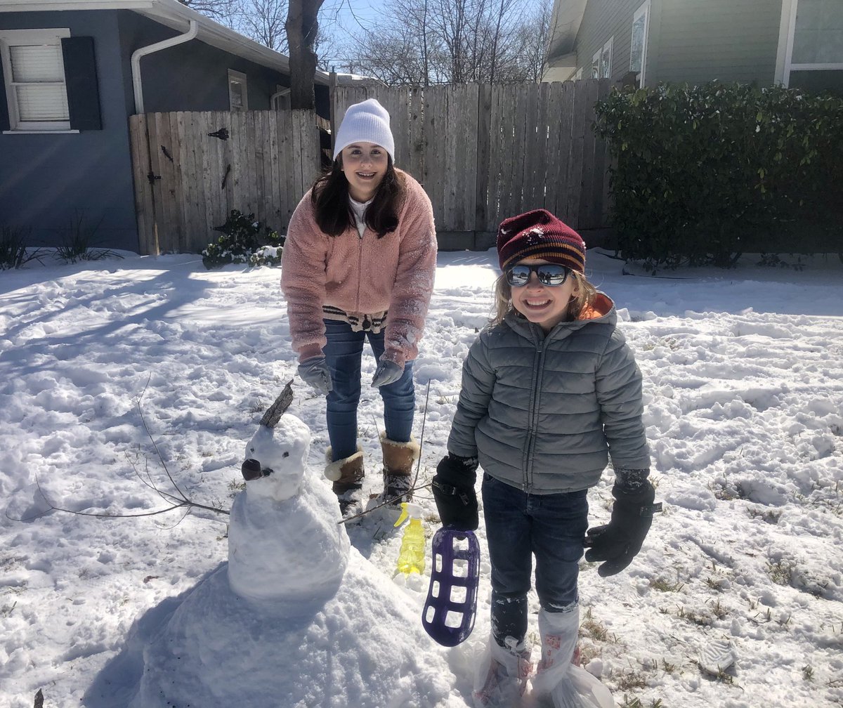 Future Senior and future Kindergartner building a snowman! ⁦<a href="/AHISD/">Alamo Heights ISD</a>⁩ #building community begins at home!
