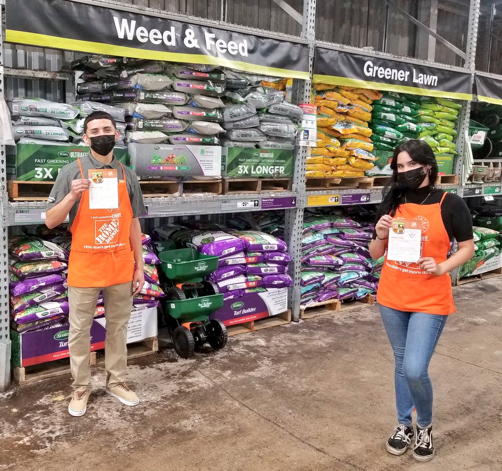 Michi &amp; Gerald being awarded merit badges for driving the BÏG 3 and KÉÈPÎNG Calle 8's Garden department the best in the market. Thank you for your great enthusiasm and hard work.