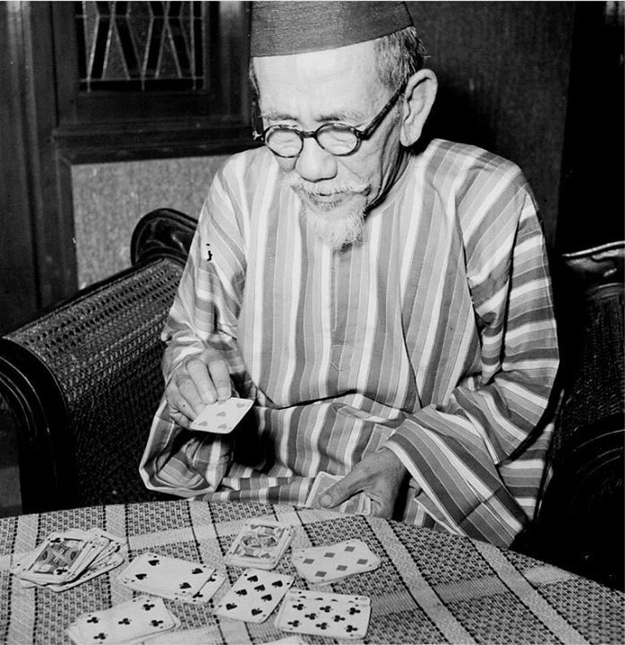 Haji Agus Salim just chilling with his stripe mandarin collar shirt