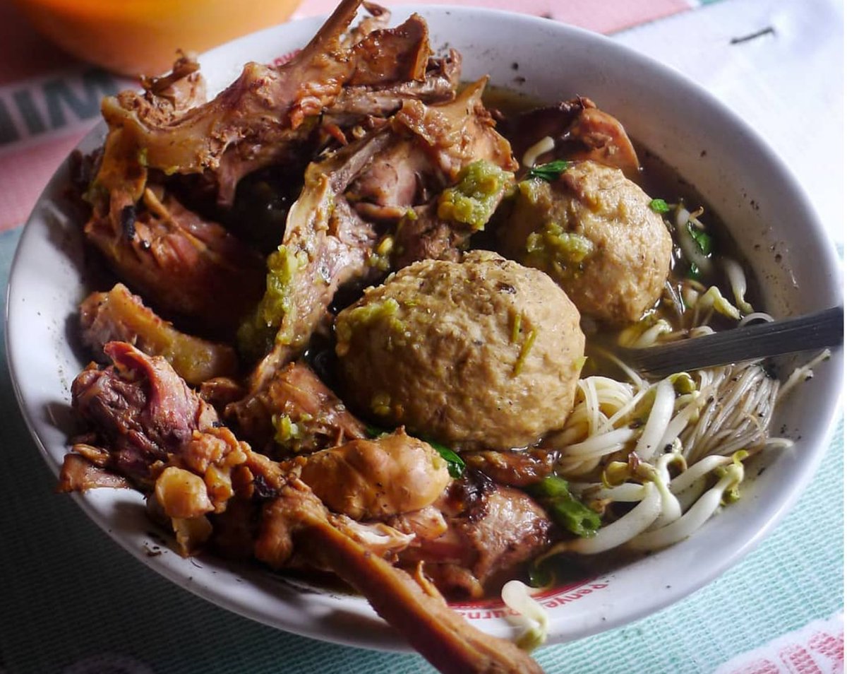 Sewage Meatball. In Indonesian: Bakso Comberan. And 'comberan' is not only the physical sewage you see (and smell) in major cities in Java, but a metaphor for a dirty mind/mouth. Unlike most bakso soup that tries to be as clean as possible, this one is black and full of...stuff.