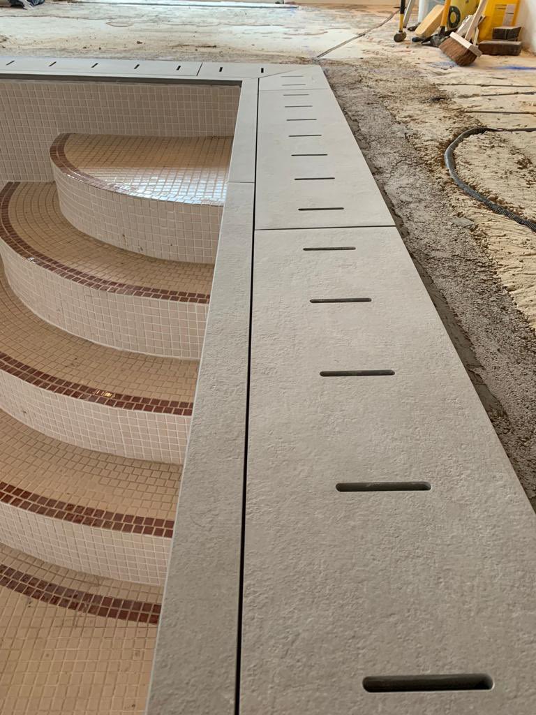 oxford_stone's tweet photo. Our bespoke made Italian porcelain deck level grilles and copings are going in at Iceberg Pools latest project, was a pleasure to supply these stunning pieces and look forward to seeing the end result! #poolcopings #porcelainpaving #oxfordstone #poolproject https://t.co/Ak9oLhTbHH
