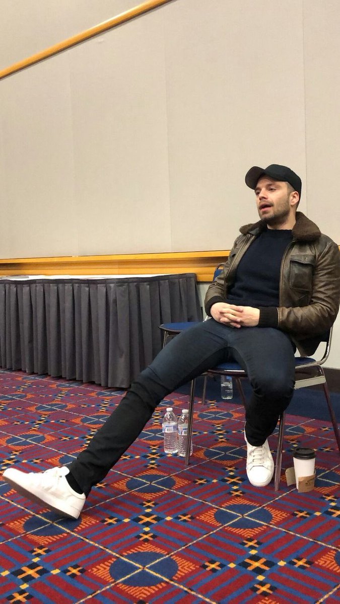 sebastian stan sitting with his legs open, a very needed thread 