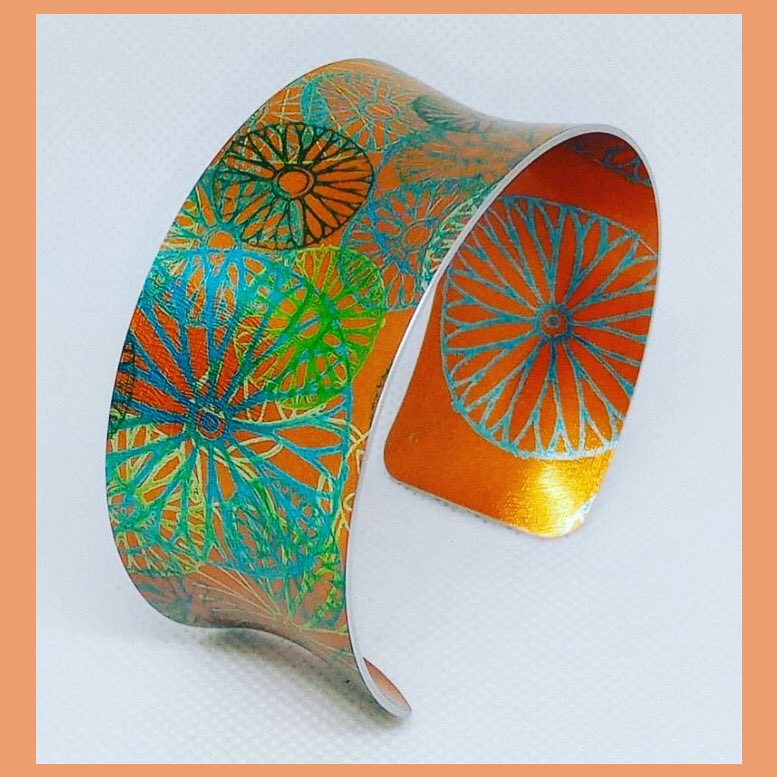 QueensArcadeNI's tweet photo. Gorgeous little design from Lauren May Jewellery called Sundial. 

Soft orange colour with a green design handmade in anodised aluminium and silver. Use the code UNI10 to get 10% off online at https://t.co/QIxsFswkws

#laurenmayjewellery #JewelleryStore #JewelleryTrends https://t.co/7uBallk39U