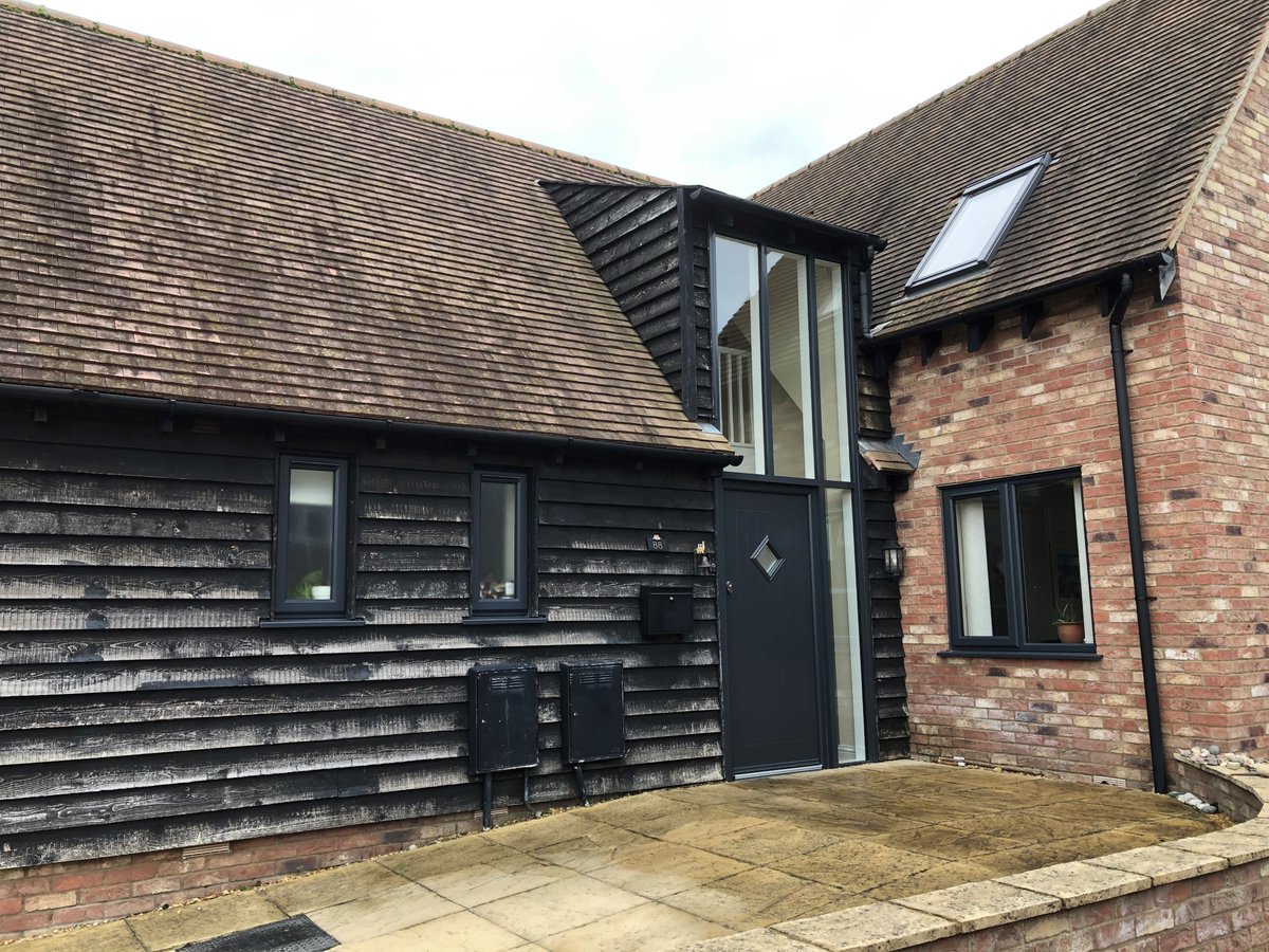 Replacement door, windows and curtain walling - a happy customer bringing this property bang on trend!