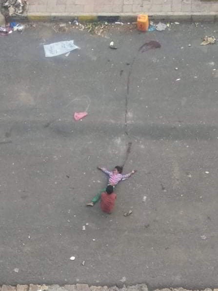 #Yemen These photos show the moment Ruwayda Saleh(8) was shot in the head by a #Houthi sniper in #Taiz, and dragged to safety by her brother Amri (10). These were taken by <a href="/AhmadAlsbai6/">Ahmed Alsbai</a>, a neighbour. Without them the world might never have known what happened to these children.