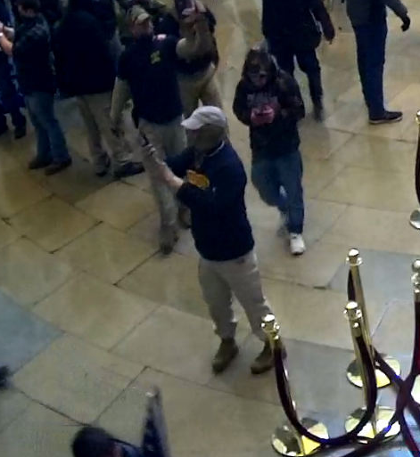 FBI's tweet photo. The search continues for individuals involved in the violence at the U.S. Capitol on January 6. If you think you know the person in these photos, leave a tip with the #FBI at https://t.co/iL7sD5efWD. Refer to photo 228 in your tip. https://t.co/wyKSJmAkWl