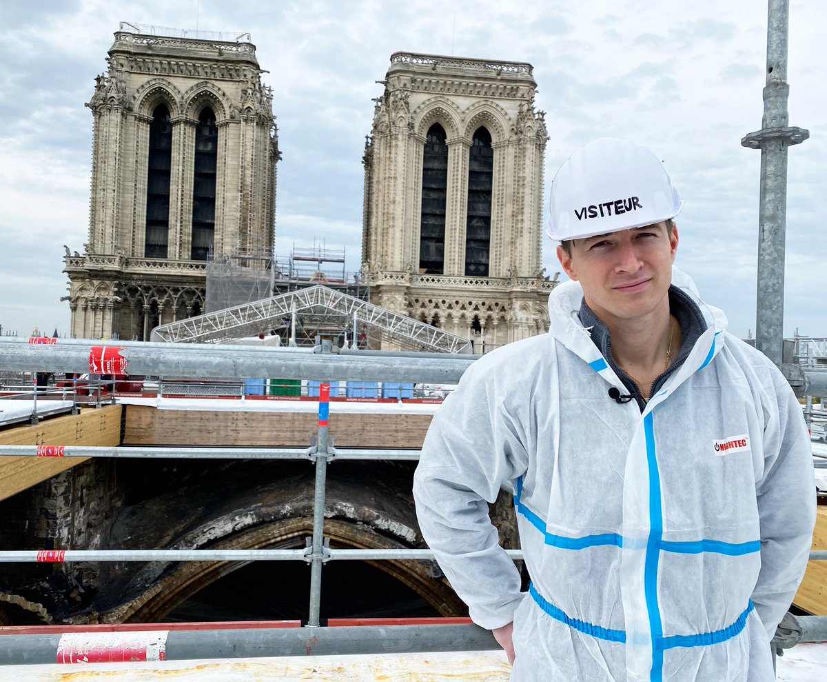 And then, at the end of an interesting and exciting day, our cameraman grabbed this photo of me asking for my phone (which I had to scrub) from the little flap in the decontamination shower