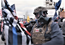 FBI's tweet image. Help the #FBI capture the rest of the individuals who took part in the violence at the U.S. Capitol. Visit tips.fbi.gov if you have information regarding this participant. When you leave a tip, refer to photo 215.