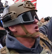 FBI's tweet image. Help the #FBI capture the rest of the individuals who took part in the violence at the U.S. Capitol. Visit tips.fbi.gov if you have information regarding this participant. When you leave a tip, refer to photo 215.