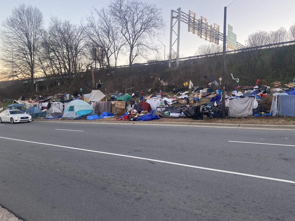 BHAMonTV's tweet photo. As residents in #TentCity pack up to leave within 72 hours due to a rodent infestation, #BlockLoveCLT still here giving free food to the homeless tonight.

A tent city resident told me he has nowhere to go. 

County is providing accommodations —> https://t.co/s4mnWOFCSY https://t.co/ynP6hNGpGs