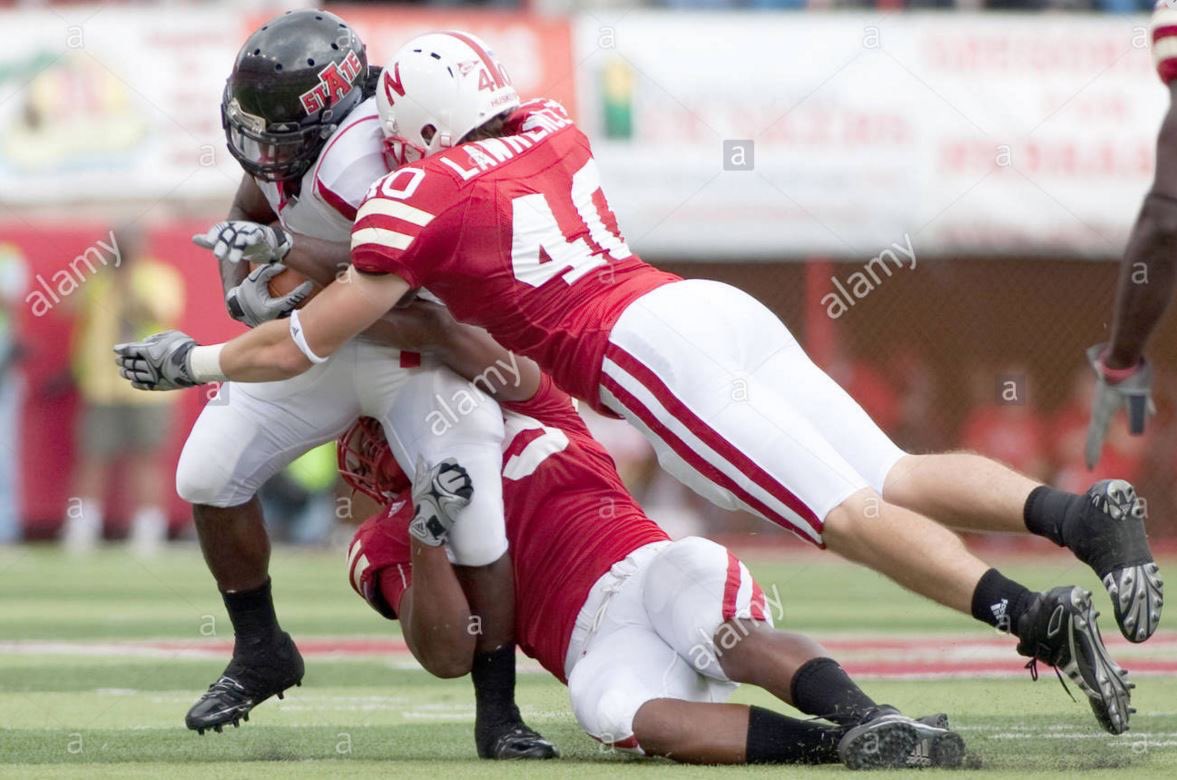 The season starts and we’re kicking ass. The Blackshirts were the top defense in the country in 2009 — holding our opponents to 10.4 points per game. Dude on left had a little bit to do with that. Dude on the right had a LOT to do with that.