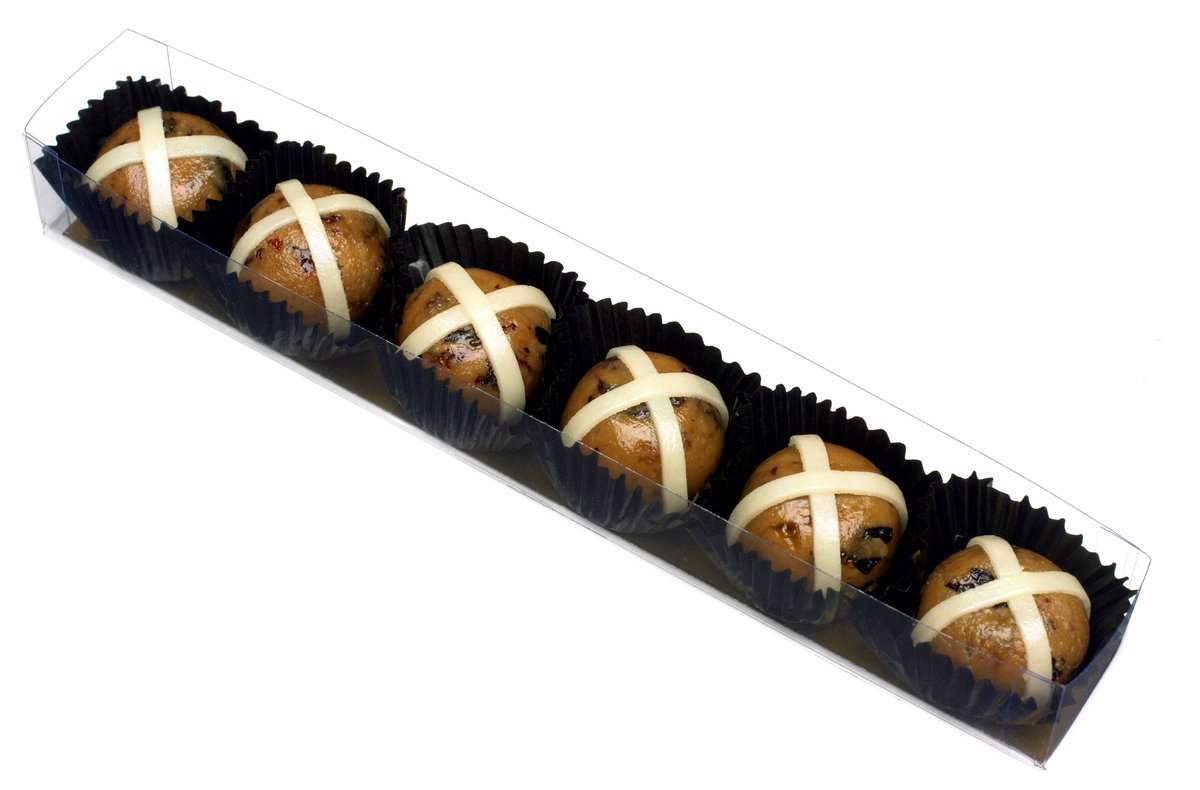Marzipan is linked to Easter Sunday through delicious Simnel Cake and with the festivities just around the corner, what better time is there to ditch the traditional mass-produced Hot Cross Bun in favour of some bite-sized versions made entirely of marzipan mixed with currants?