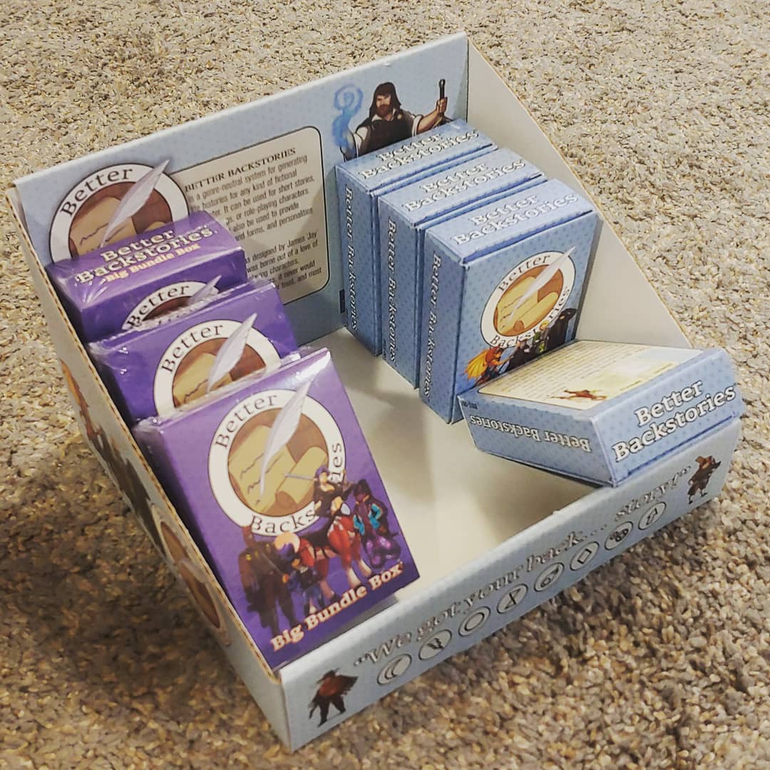 Backstories22's tweet image. Point of sale display boxes have arrived!  Notify your game store about Better Backstories today!

Illustrations by @Blazbaros 
Layout by Tim Mazurek
Printed by @Fantastapack
