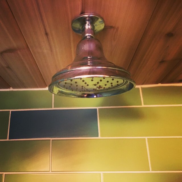 LongPointLodge's tweet photo. Both cabins have newly renovated bathrooms.Its been important while renovating to maintain the original charm/modern upgrade in the Bathrooms’s was essential.The Milly Cabin bathroom now has a new pebble rock floor,a rainfall shower headwith cedar &amp; these fun coloured tiles. https://t.co/Scuiy1gR84
