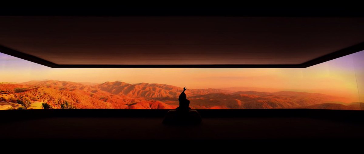 as hobi goes from the red/green room to the orange/blue room, it goes from a medium shot to a wide shot, which is when the subject is far from the camera and it is to accentuate the scale of the subject compared to their environment.